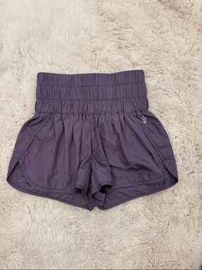 FP Movement by Free People High-Rise Smocked Athletic Shorts in Plum
